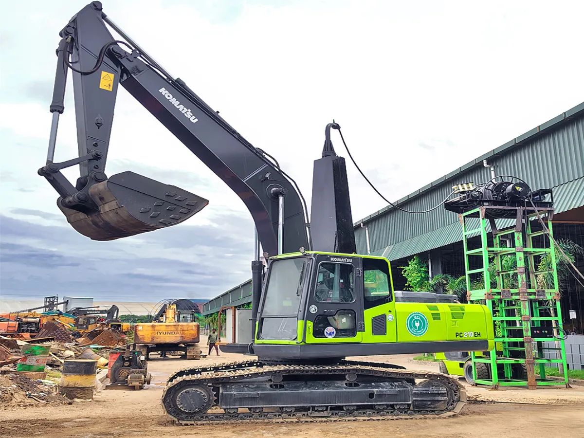 Hybrid excavator with cable reel at a quarry